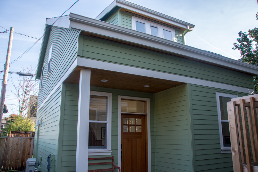  SW Portland Custom home: Main Floor living with flexible spaces on upper level. Wood shop next to garage. 	 